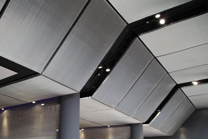 Metal mesh ceiling panels in a commercial interior