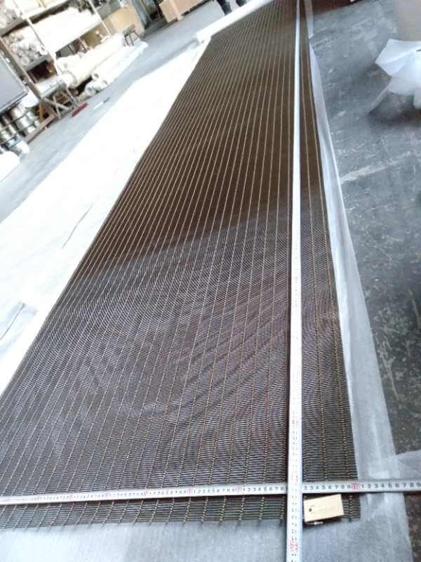 Measuring and inspecting a woven metal mesh panel before dispatch